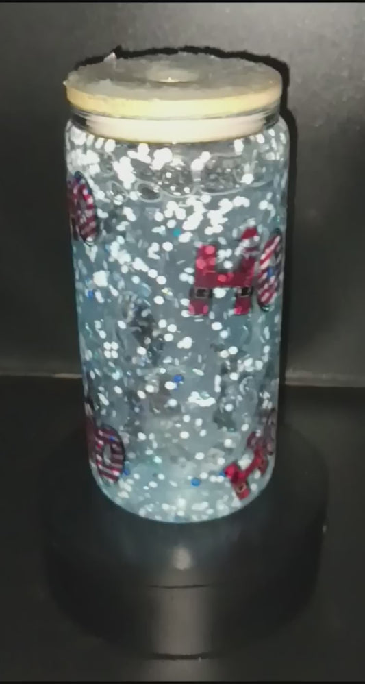Santa Claus glass tumbler 16 oz glows in the dark when charged